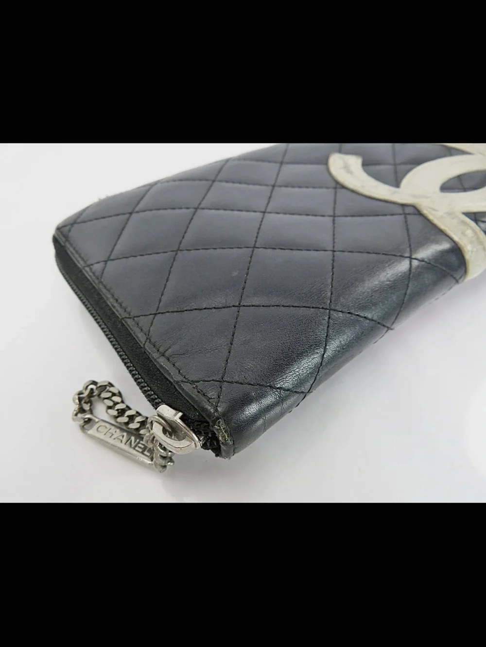 CHANEL Black Quilted Leather Zip Wallet with White CC Patch